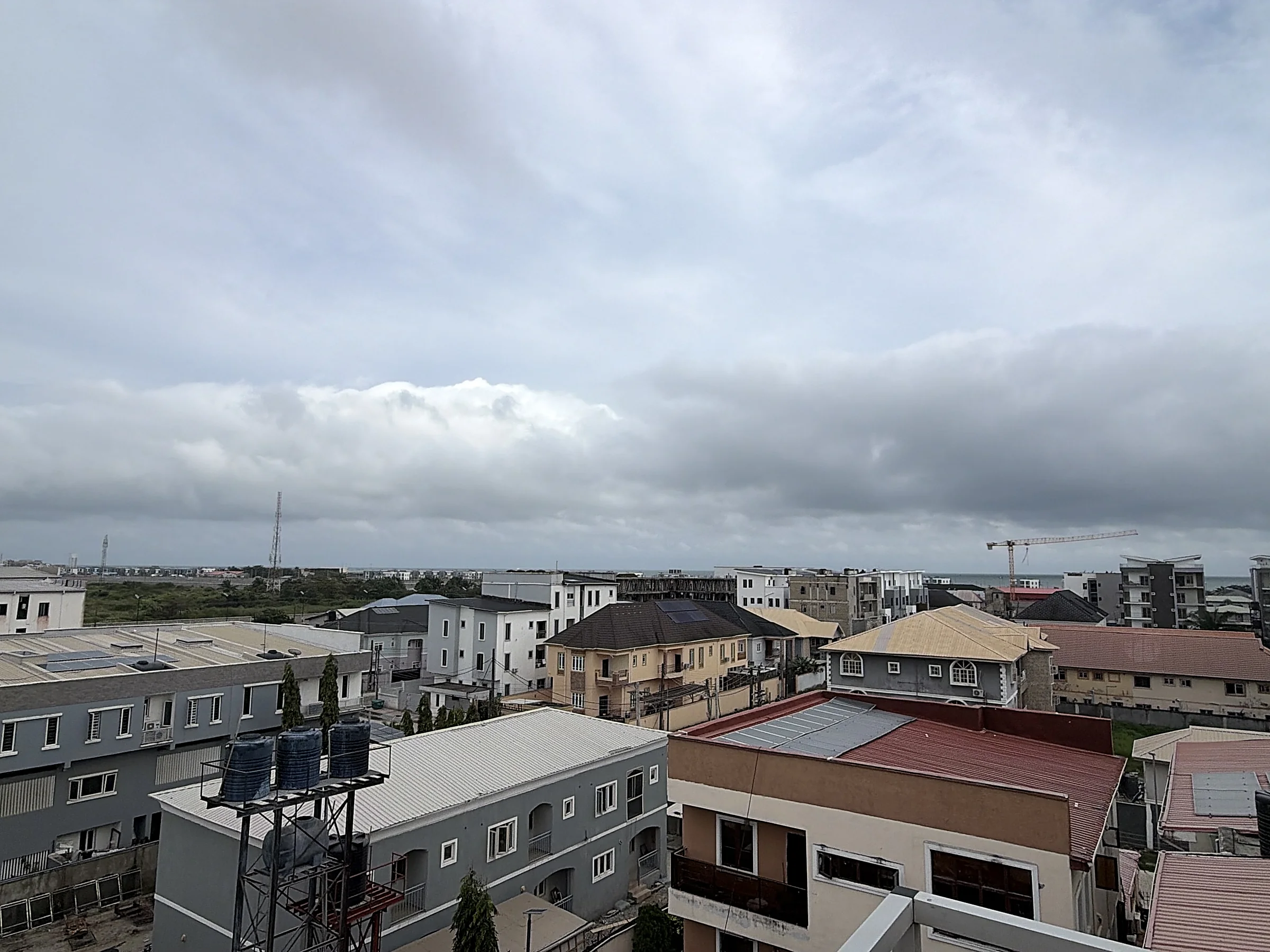 Elevated view from Canary Penthouse across Ilasan toward the distant Atlantic Ocean